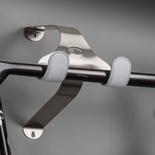 Load image into Gallery viewer, Cactus Tongue SSL bike hanger with white leather sleeves holding a black bike
