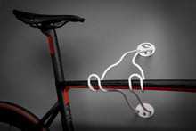 Load image into Gallery viewer, Back and red Colnago V3rs resting on a white AIR roadie bike hanger against a grey wall
